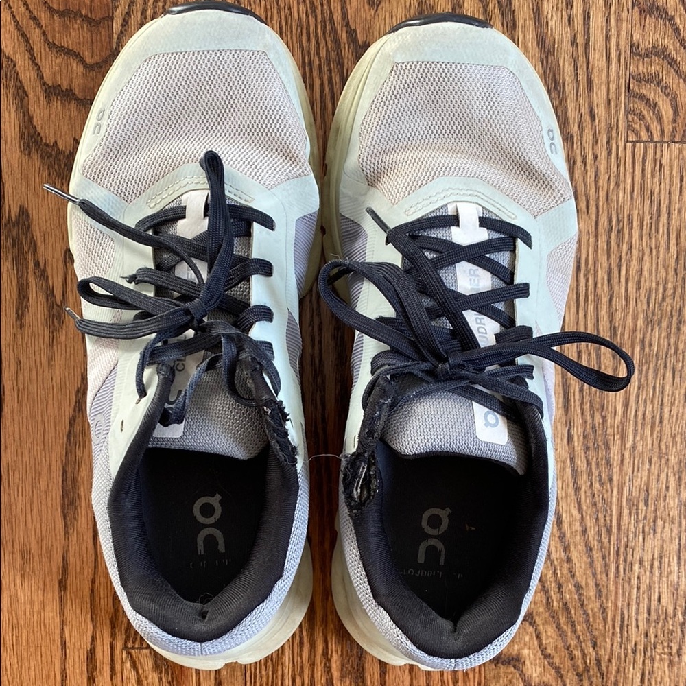 On Running Cloudrunner sneakers, size 8. Distressed areas shown in pictures